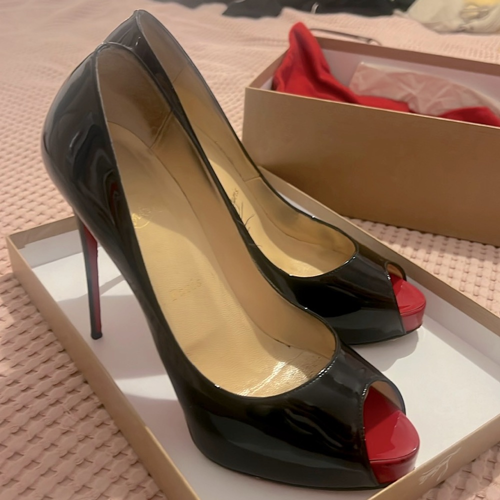 Christen Louboutin VERY PRIVE patent peep toe heels.